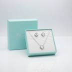 Conjunto Collar y Pendientes de Trébol con Centro Texturizado - 100% Acero Bañado en Rodio