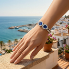 Pulsera Rígida con Dos Cristales Azules Ovalados y Circonitas - 100% Acero Bañado en Rodio