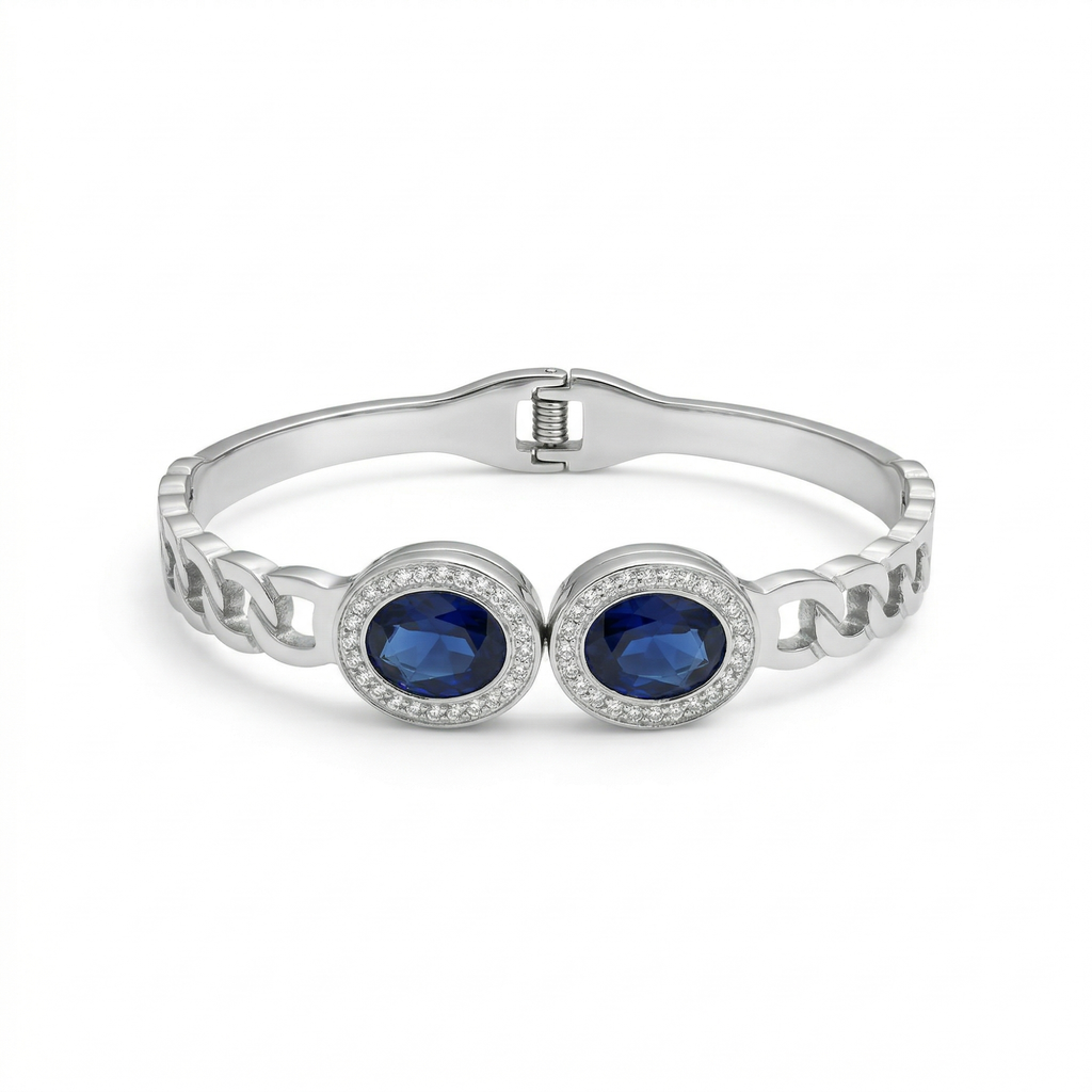 Pulsera Rígida con Dos Cristales Azules Ovalados y Circonitas - 100% Acero Bañado en Rodio