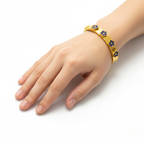 Pulsera Rígida con Tréboles Azules y Detalles Grabados 100% Acero Bañado en Oro 18K