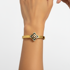 Pulsera Rígida con Flor de Cuatro Pétalos Esmaltada y Circonitas - 100% Acero Bañado en Oro 18K