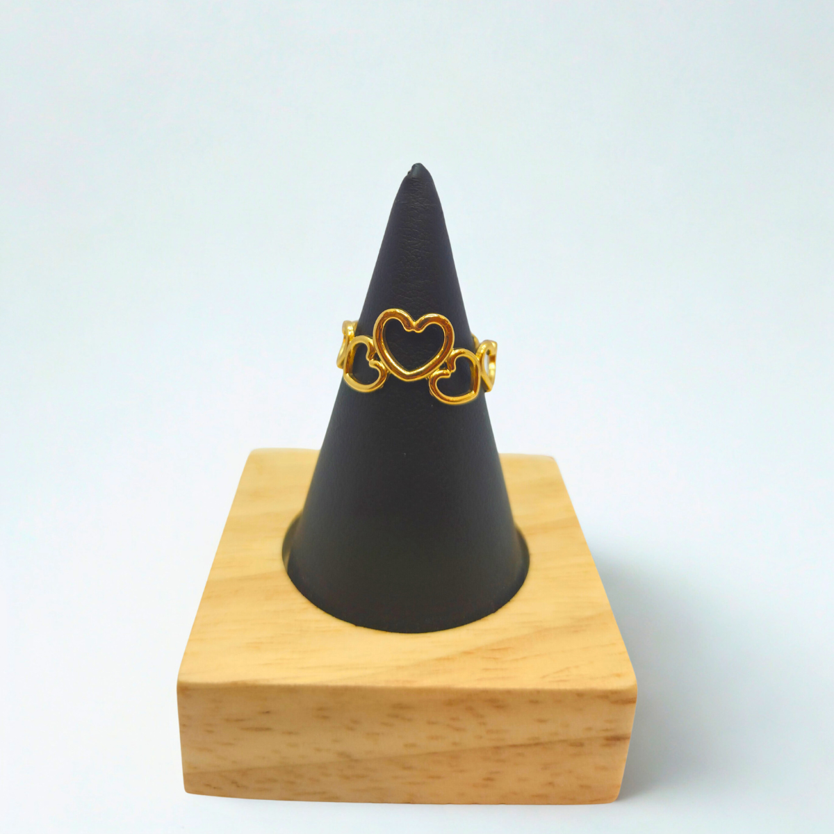 Anillo de Corazones Entrelazados - 100% Acero Bañado en Oro de 18K . Adjustable