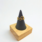 Anillo de Corazones Entrelazados - 100% Acero Bañado en Oro de 18K . Adjustable